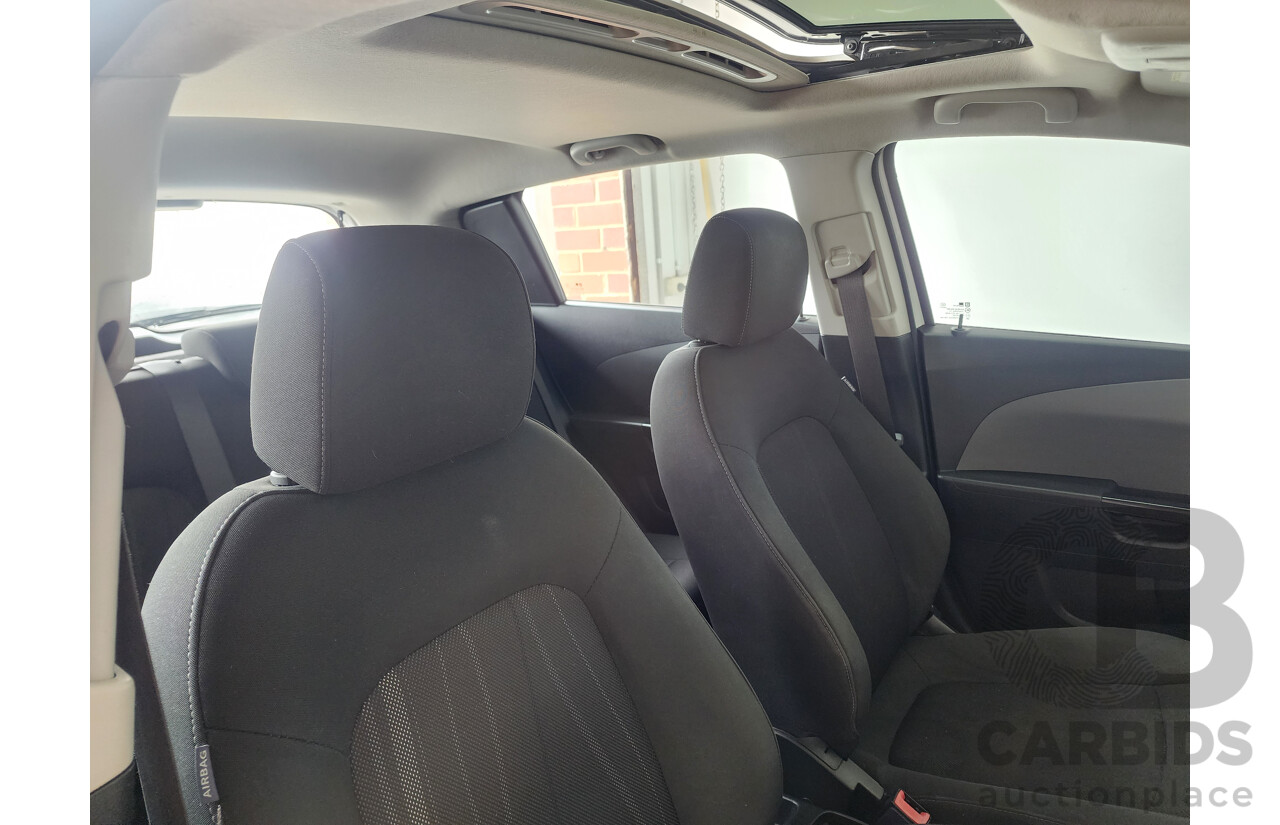 4/2013 Holden Barina CD TM MY13 5d Hatchback White 1.6L