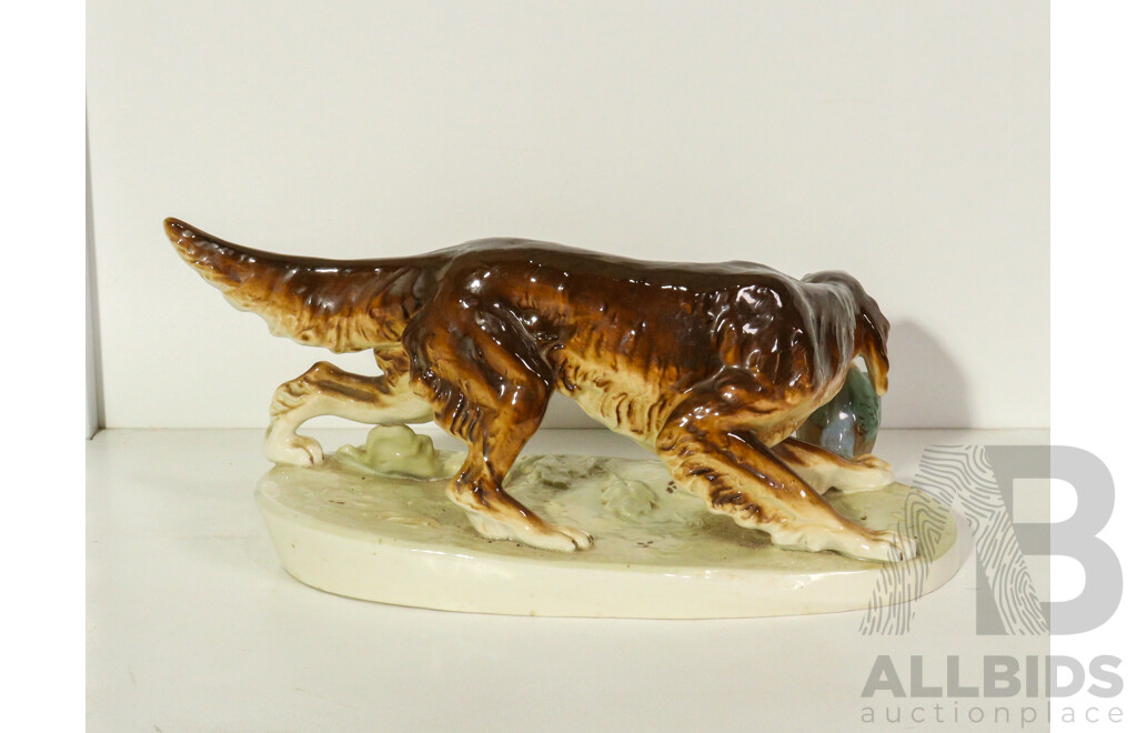 Three Porcelain Dogs Including a Pointer, Terrier and Irish Setter with Duck in Mouth