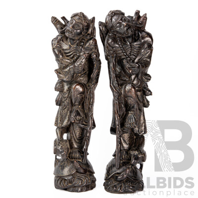 Pair Carved Chinese Hardwood Immortal Figures with Intricate Brass Inlay