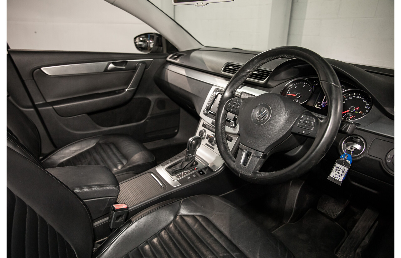 4/2014 Volkswagen Passat 130 TDI Highline 3C MY14 4d Wagon Deep Black Pearl Turbo Diesel 2.0L