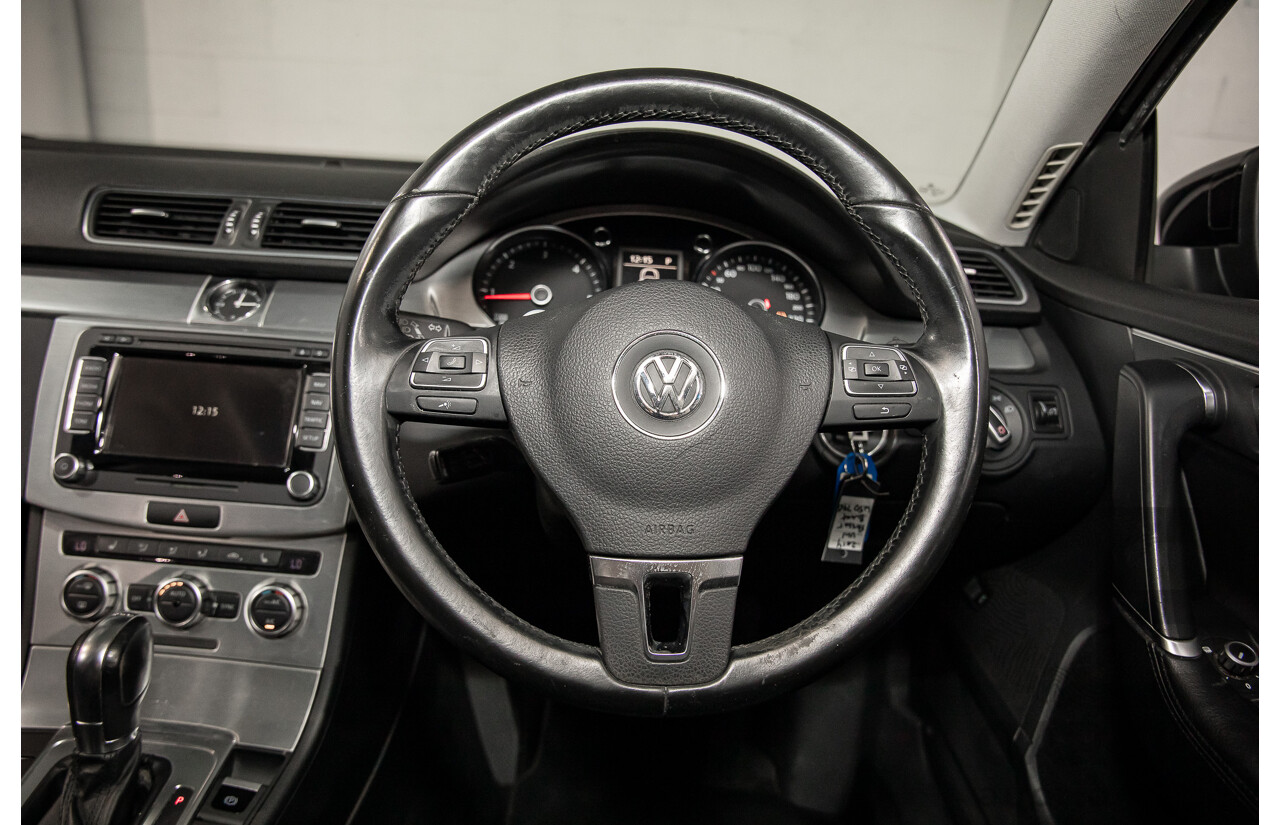 4/2014 Volkswagen Passat 130 TDI Highline 3C MY14 4d Wagon Deep Black Pearl Turbo Diesel 2.0L