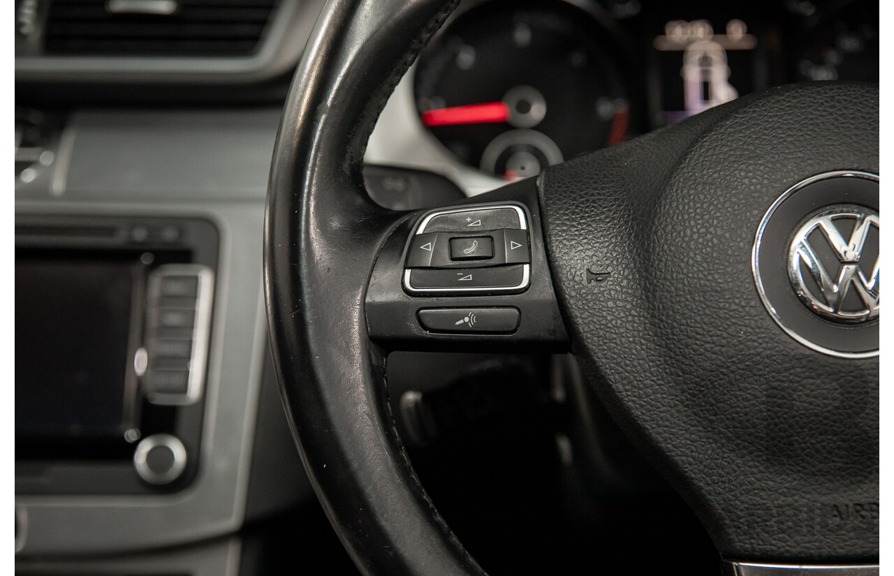 4/2014 Volkswagen Passat 130 TDI Highline 3C MY14 4d Wagon Deep Black Pearl Turbo Diesel 2.0L