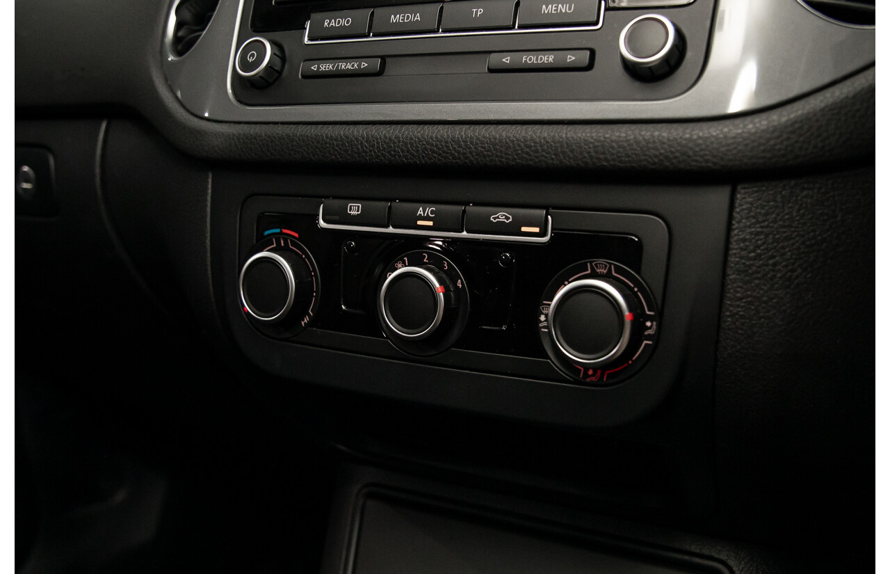 7/2014 Volkswagen Tiguan 118 TSI (4x2) 5NC MY14.5 4d Wagon Pure White Twincharged 1.4L