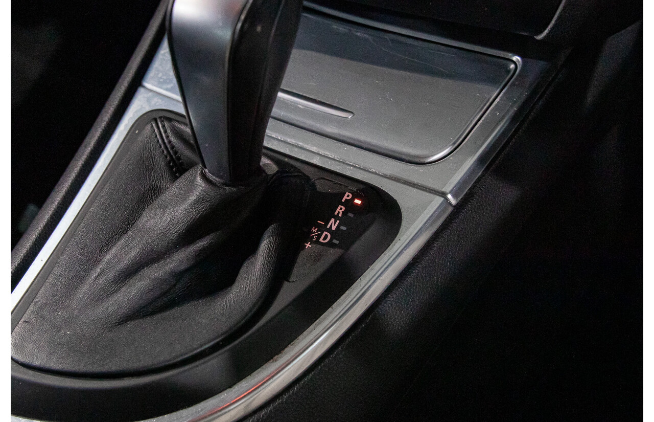 4/2013 BMW 120i E82 MY12.5 2d Coupe Alpine White 2.0L