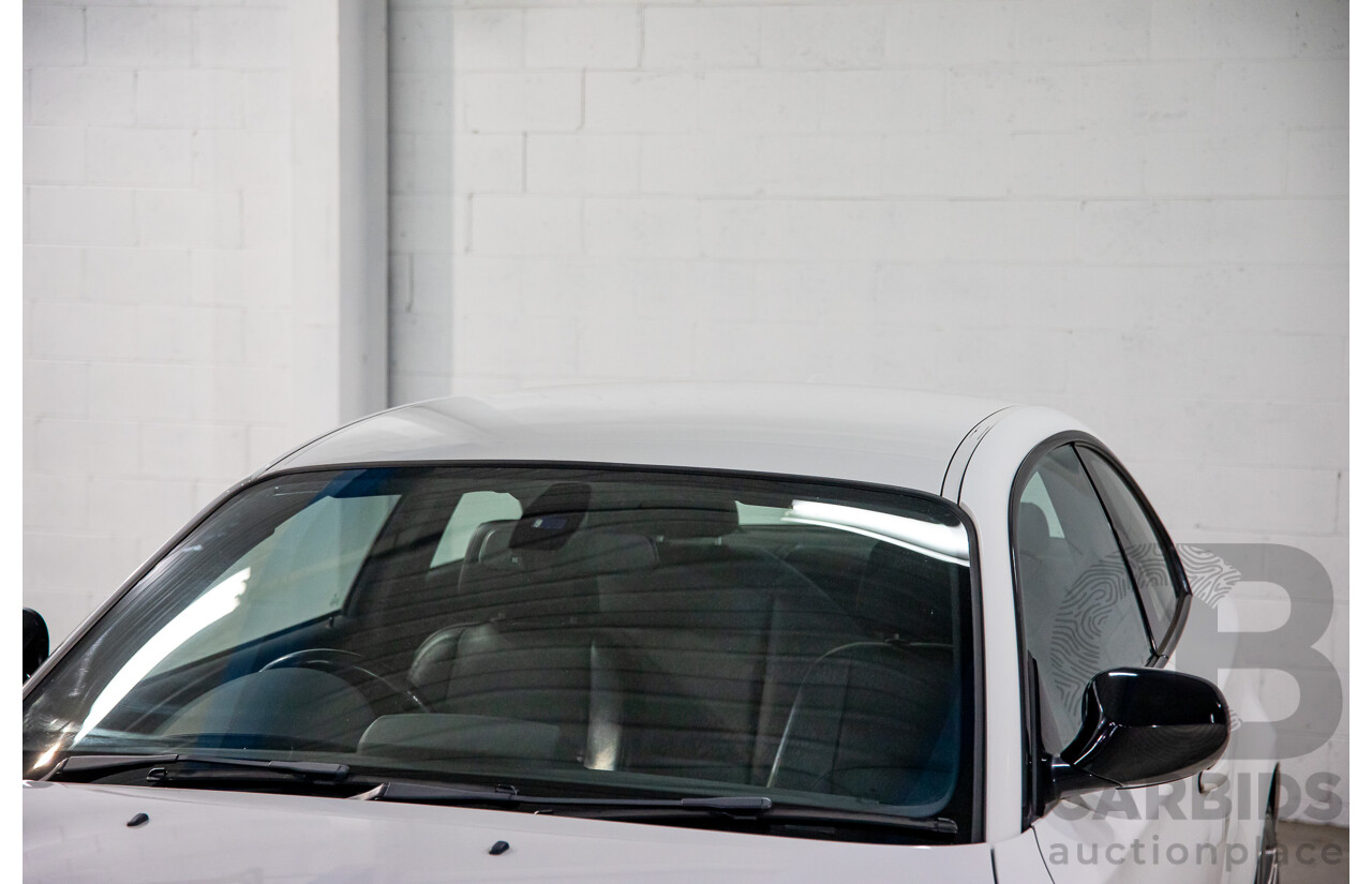 4/2013 BMW 120i E82 MY12.5 2d Coupe Alpine White 2.0L