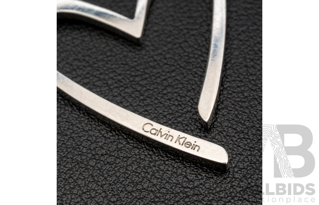 Calvin Klein Branded Silver Tone Necklace with Open Heart Shape Pendant