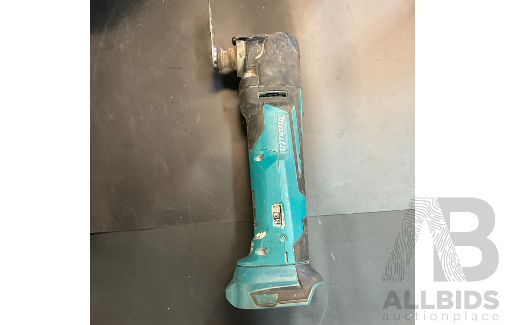 Three Makita Power Tools with Hand Tools in Milwaukee Carry Bag