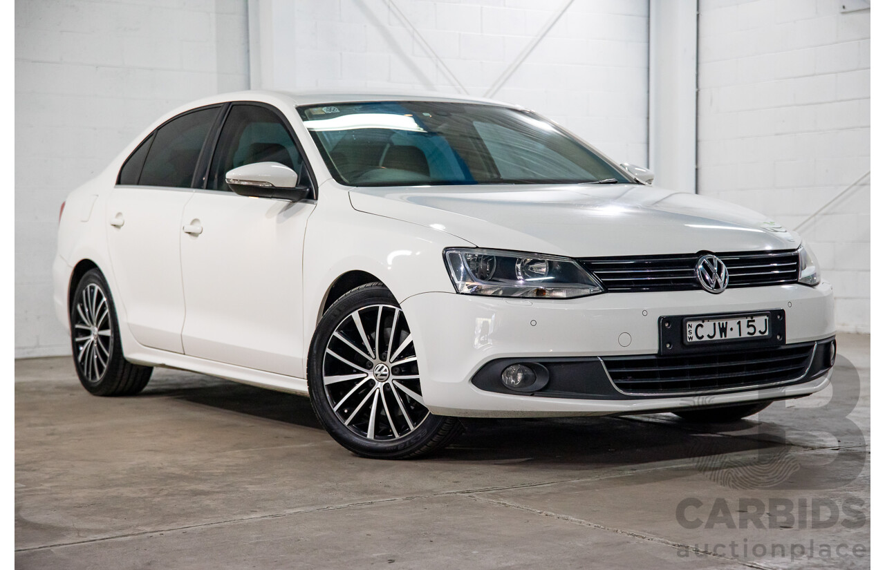 11/2012 Volkswagen Jetta 147 TSI Highline 1KM MY13 4d Sedan Candy White Turbo 2.0L