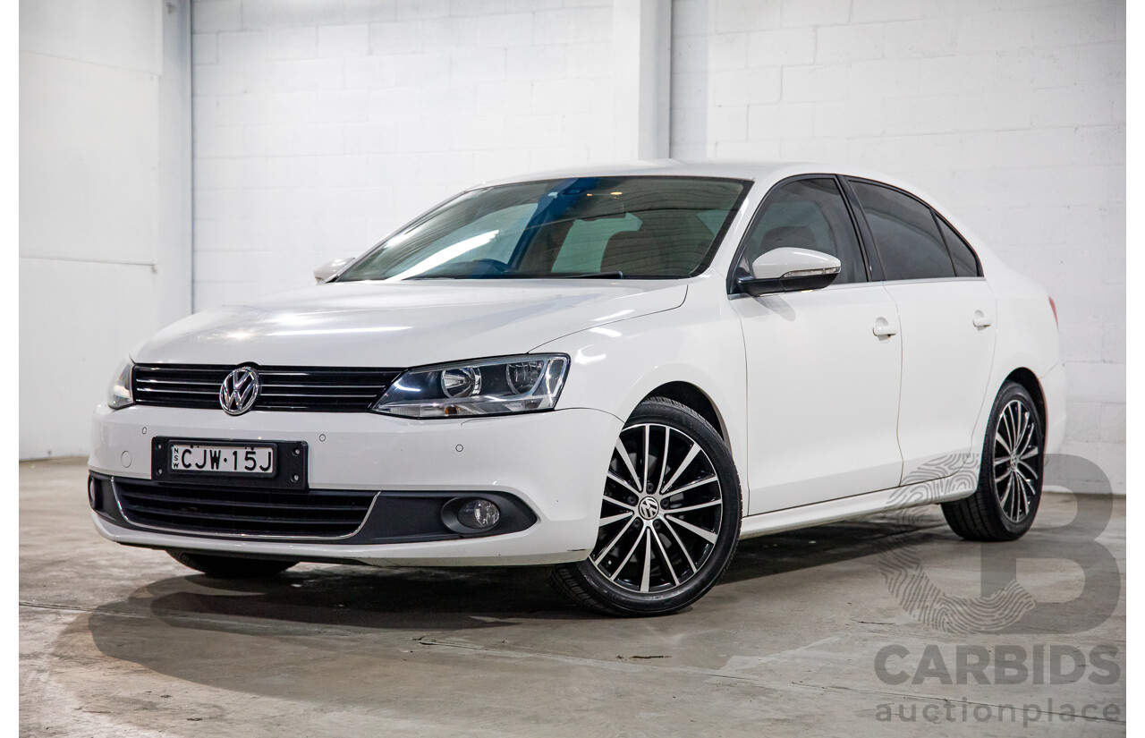 11/2012 Volkswagen Jetta 147 TSI Highline 1KM MY13 4d Sedan Candy White Turbo 2.0L