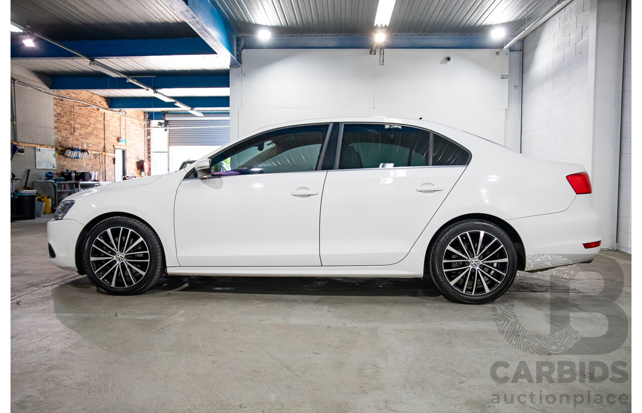 11/2012 Volkswagen Jetta 147 TSI Highline 1KM MY13 4d Sedan Candy White Turbo 2.0L