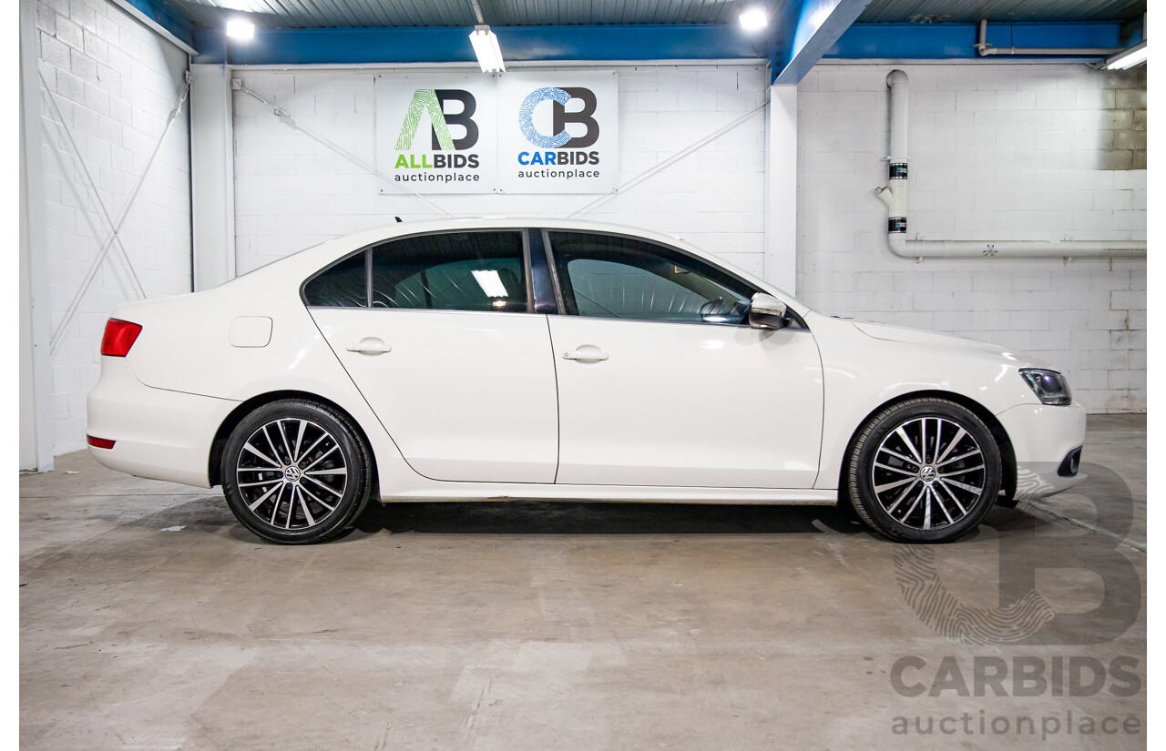 11/2012 Volkswagen Jetta 147 TSI Highline 1KM MY13 4d Sedan Candy White Turbo 2.0L