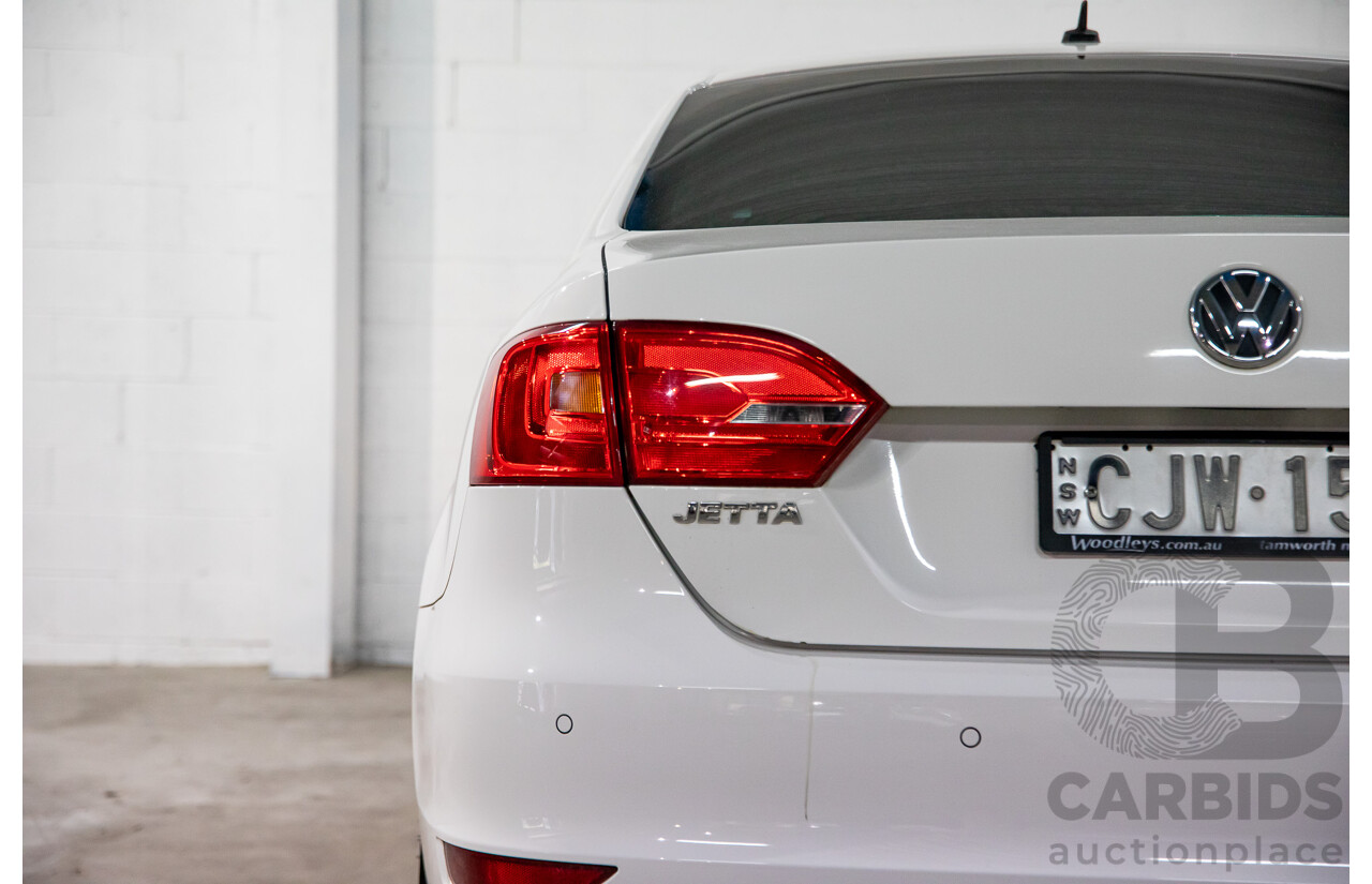 11/2012 Volkswagen Jetta 147 TSI Highline 1KM MY13 4d Sedan Candy White Turbo 2.0L
