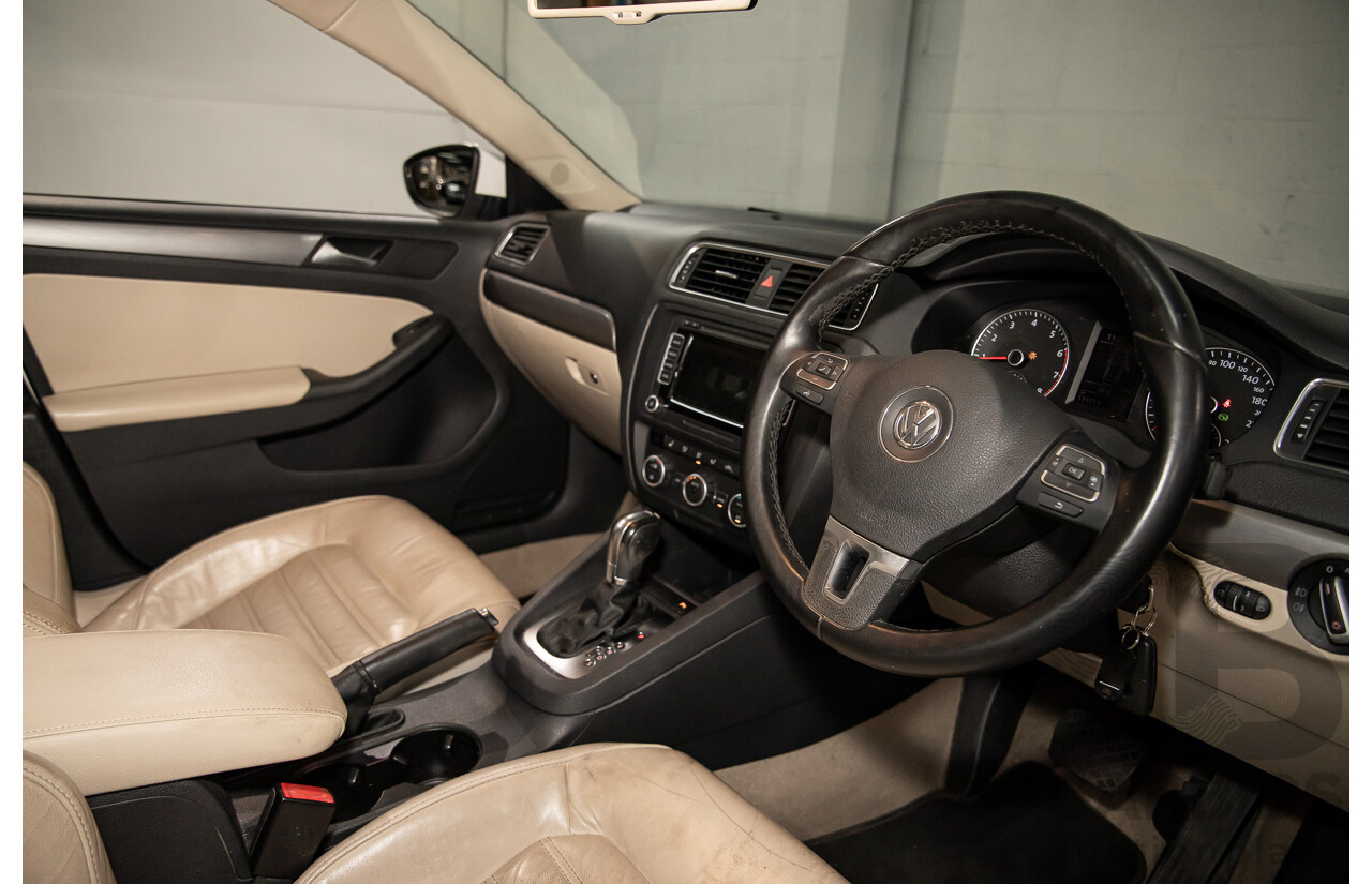 11/2012 Volkswagen Jetta 147 TSI Highline 1KM MY13 4d Sedan Candy White Turbo 2.0L