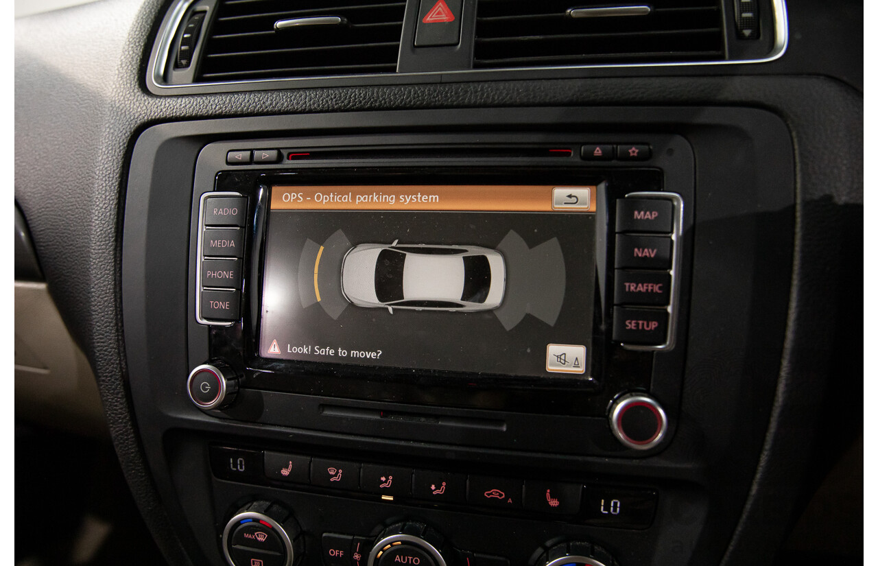 11/2012 Volkswagen Jetta 147 TSI Highline 1KM MY13 4d Sedan Candy White Turbo 2.0L