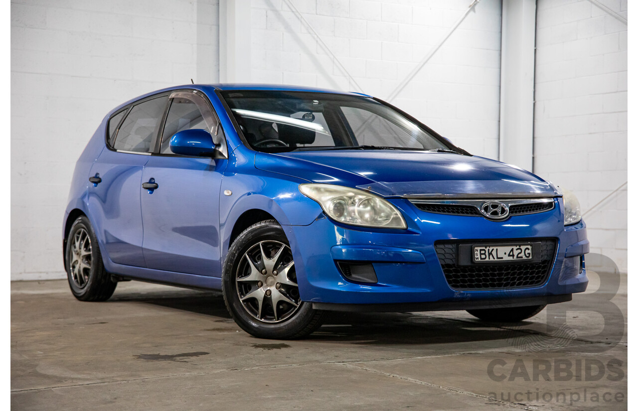 6/2009 Hyundai i30 SX 1.6 CRDi FD MY09 5d Hatchback Vivid Blue Turbo Diesel 1.6L