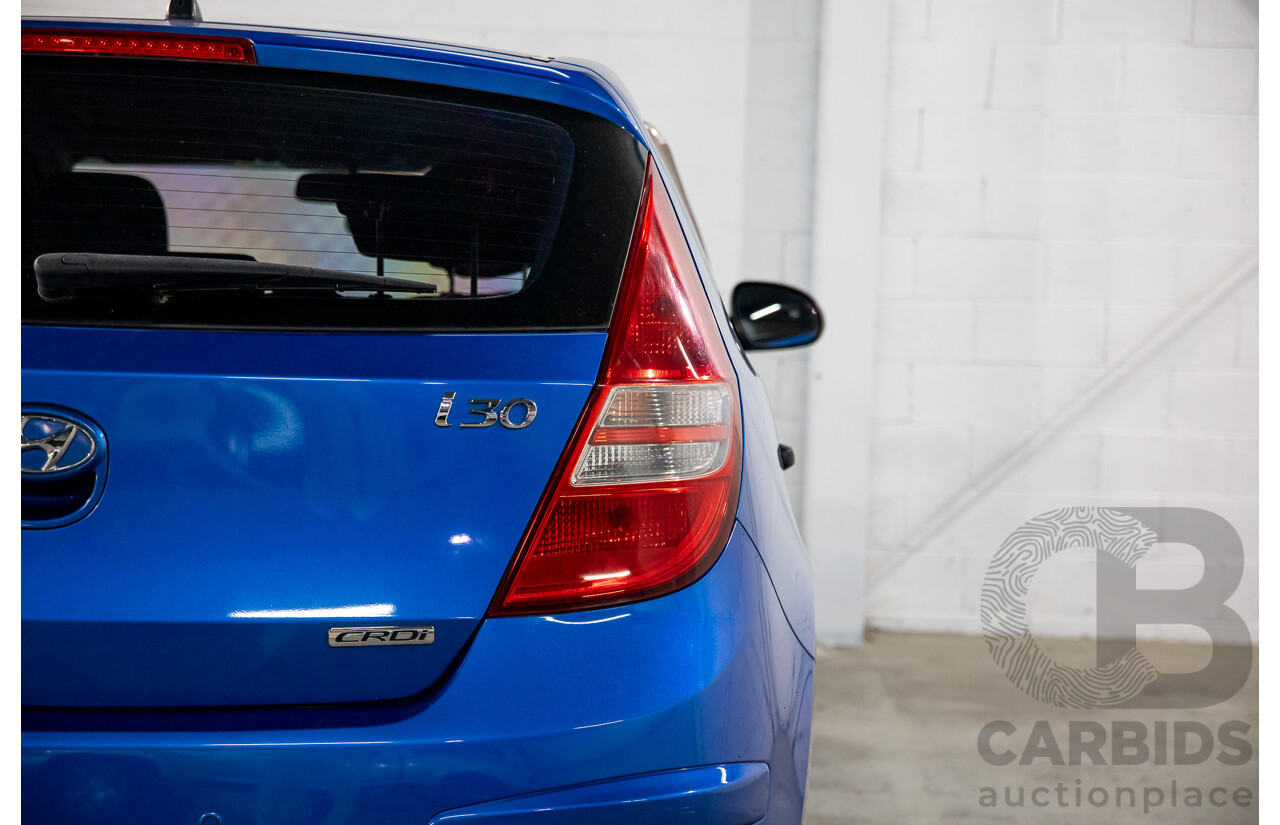 6/2009 Hyundai i30 SX 1.6 CRDi FD MY09 5d Hatchback Vivid Blue Turbo Diesel 1.6L