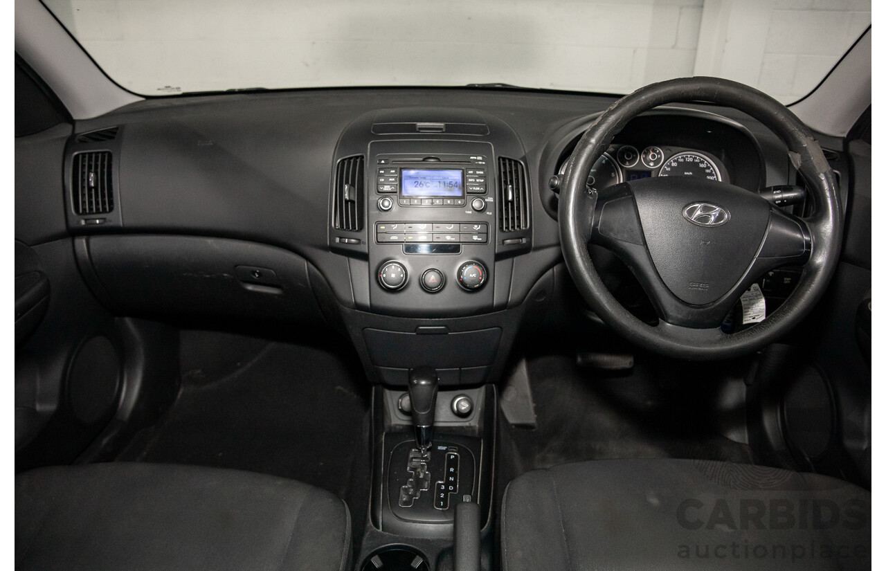 6/2009 Hyundai i30 SX 1.6 CRDi FD MY09 5d Hatchback Vivid Blue Turbo Diesel 1.6L