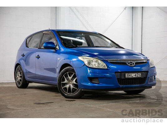 6/2009 Hyundai i30 SX 1.6 CRDi FD MY09 5d Hatchback Vivid Blue Turbo Diesel 1.6L