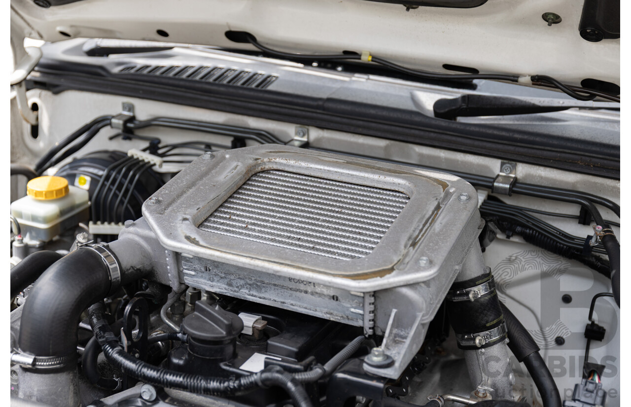 5/2013 Nissan Navara DX (4x2) D22 SERIES 5 C/Chas Polar White Turbo Diesel 2.5L