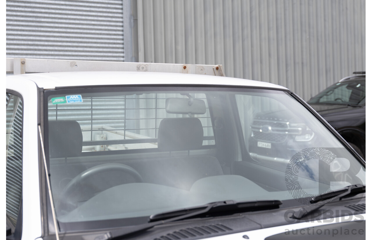 5/2013 Nissan Navara DX (4x2) D22 SERIES 5 C/Chas Polar White Turbo Diesel 2.5L