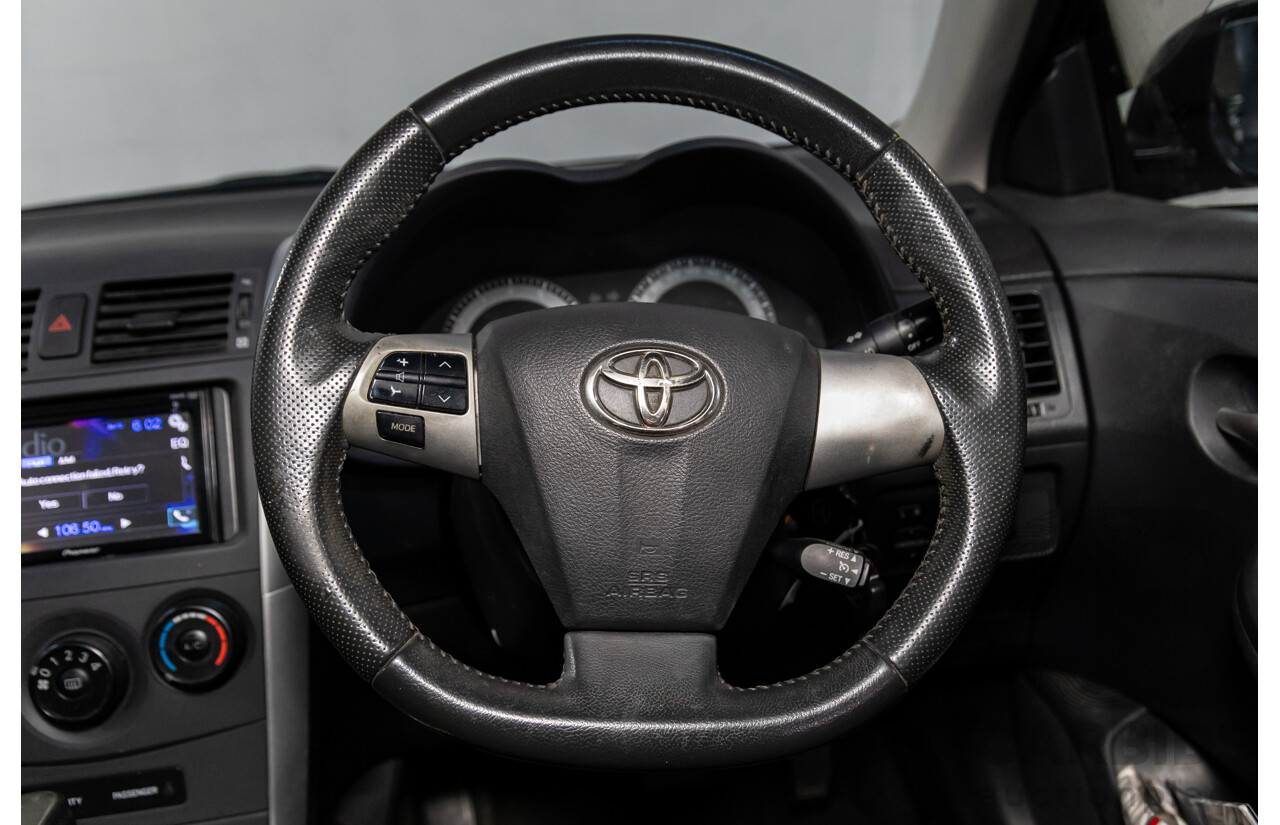 2/2012 Toyota Corolla Ascent Sport ZRE152R MY11 4d Sedan Graphite Grey Metallic 1.8L