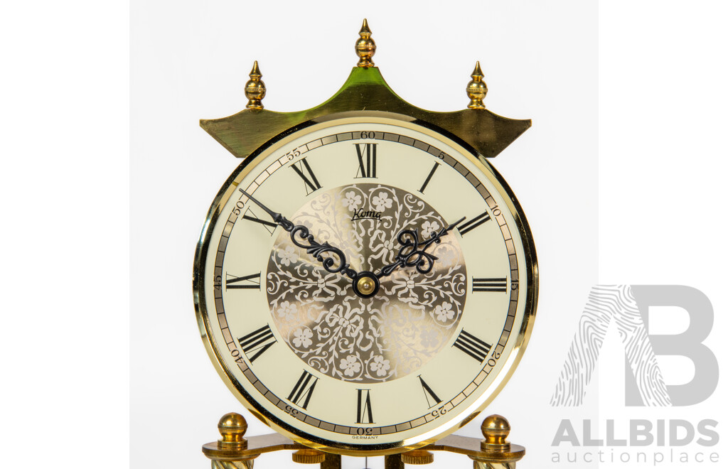 Pair of Graduated Glass Dome Anniversary Clocks with Rotating Pendulum by Prestige