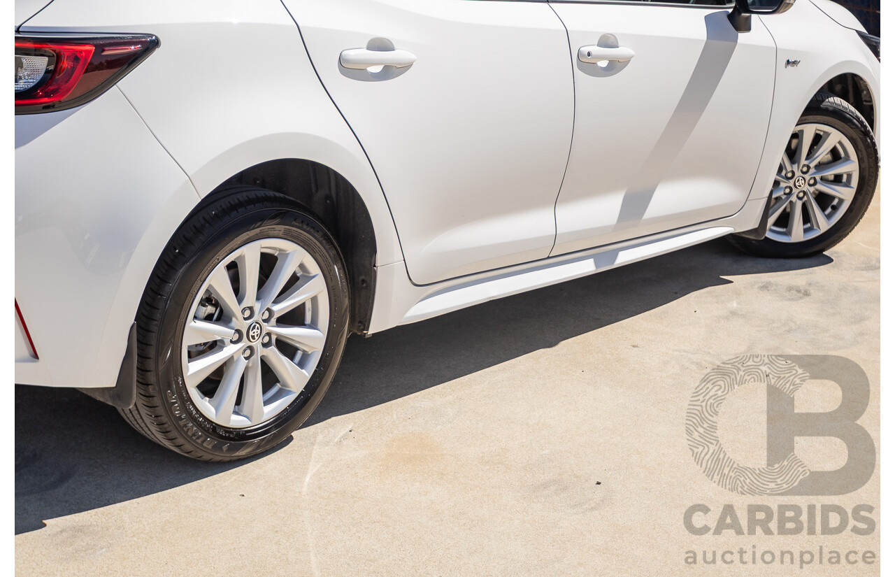 11/2024 Toyota Corolla Ascent Sport Hybrid ZWE219R 5D Hatchback Glacier White 1.8L - 70kw Hybrid