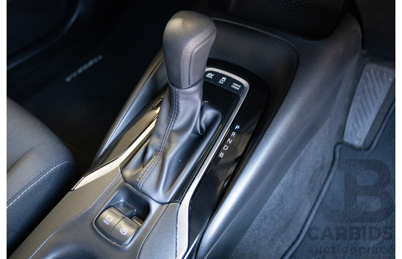 11/2024 Toyota Corolla Ascent Sport Hybrid ZWE219R 5D Hatchback Glacier White 1.8L - 70kw Hybrid