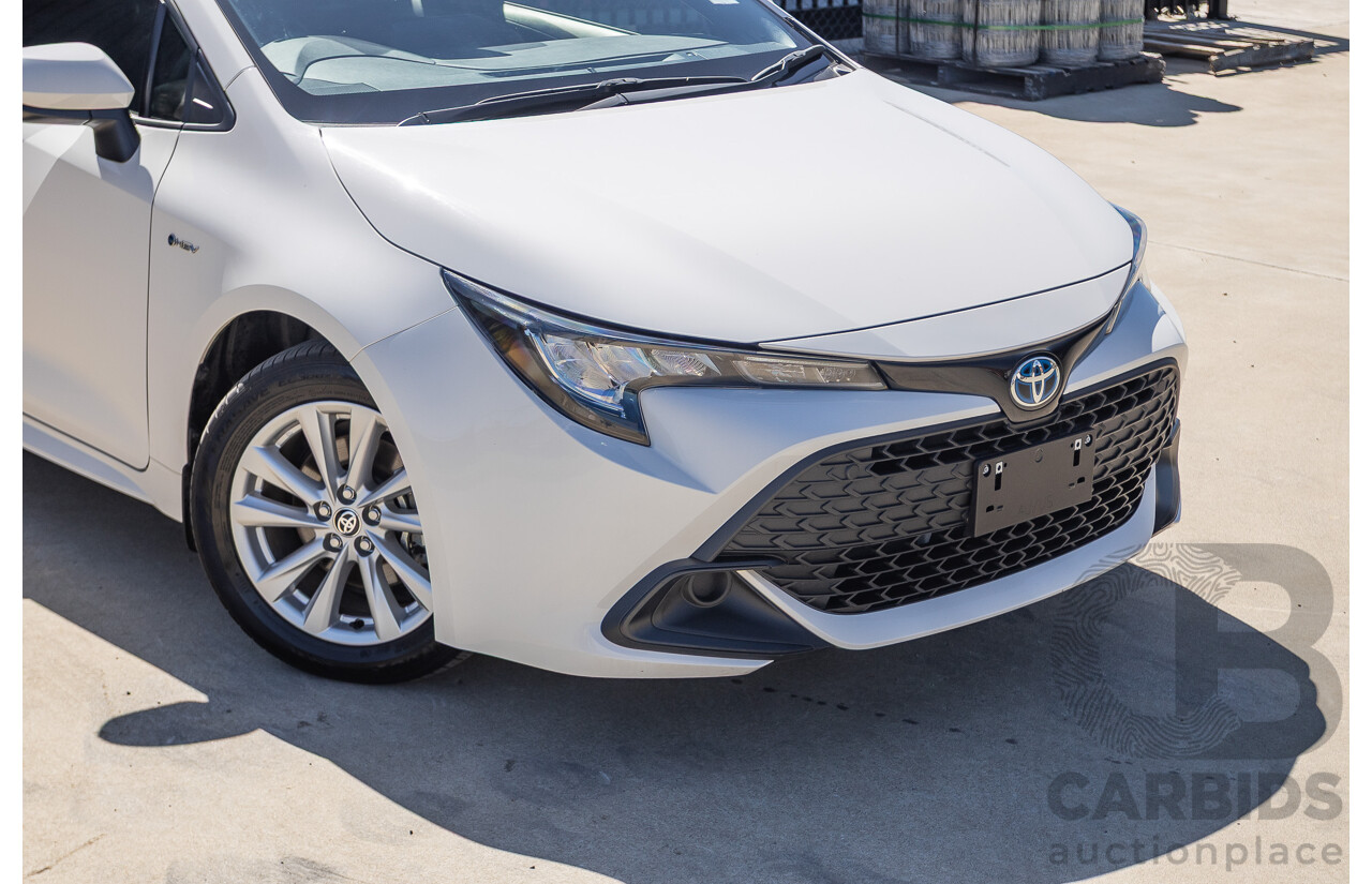 11/2024 Toyota Corolla Ascent Sport Hybrid ZWE219R 5D Hatchback Glacier White 1.8L - 70kw Hybrid