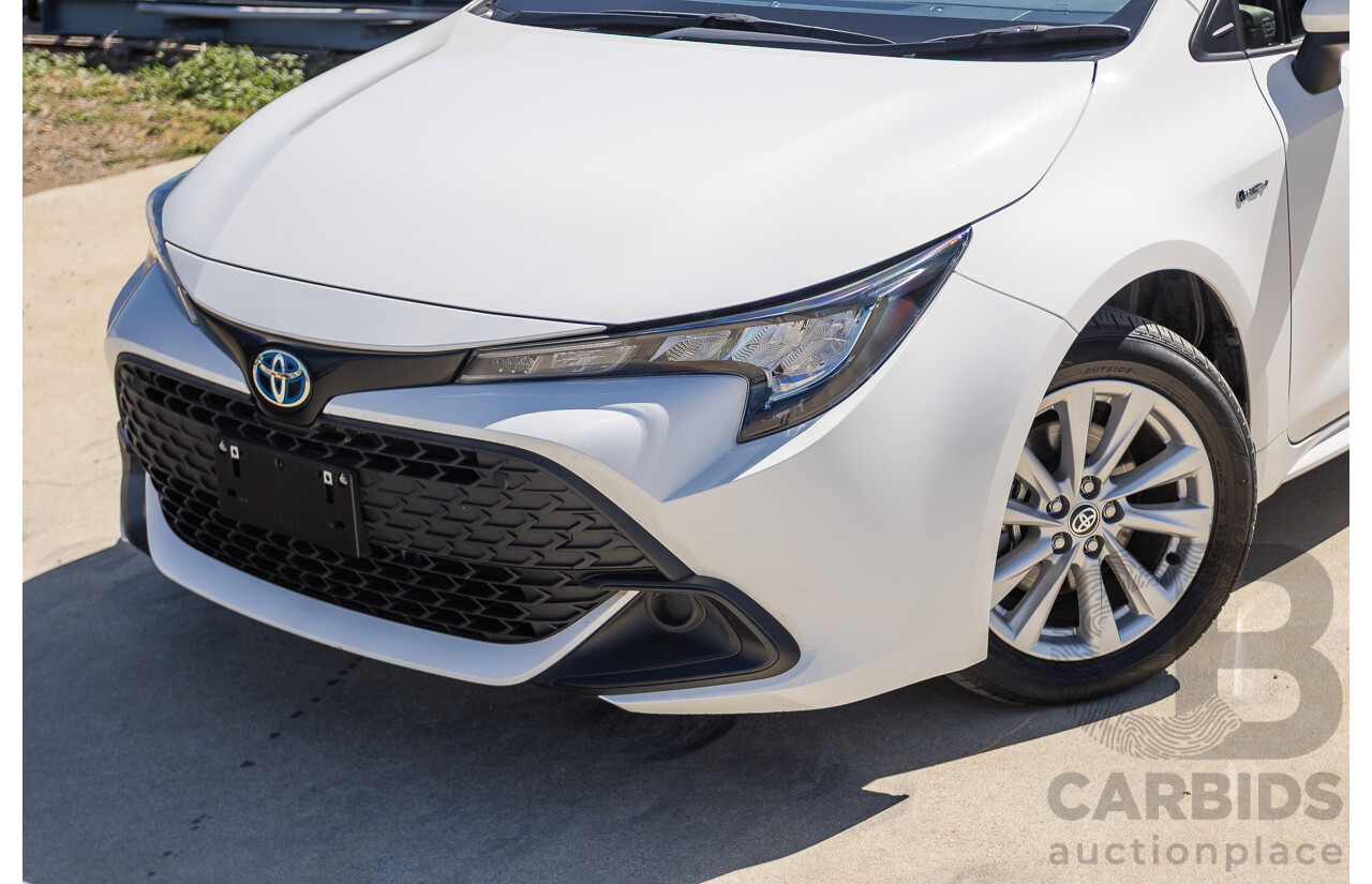 11/2024 Toyota Corolla Ascent Sport Hybrid ZWE219R 5D Hatchback Glacier White 1.8L - 70kw Hybrid
