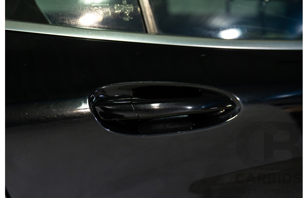 11/2014 Mercedes-Benz GLA200 CDI (FWD) X156 4d Wagon Cosmos Black Metallic Turbo 2.1L