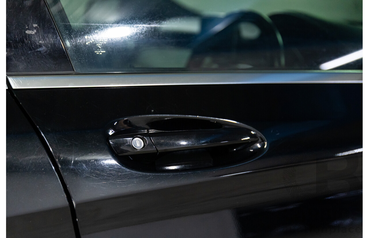 11/2014 Mercedes-Benz GLA200 CDI (FWD) X156 4d Wagon Cosmos Black Metallic Turbo 2.1L