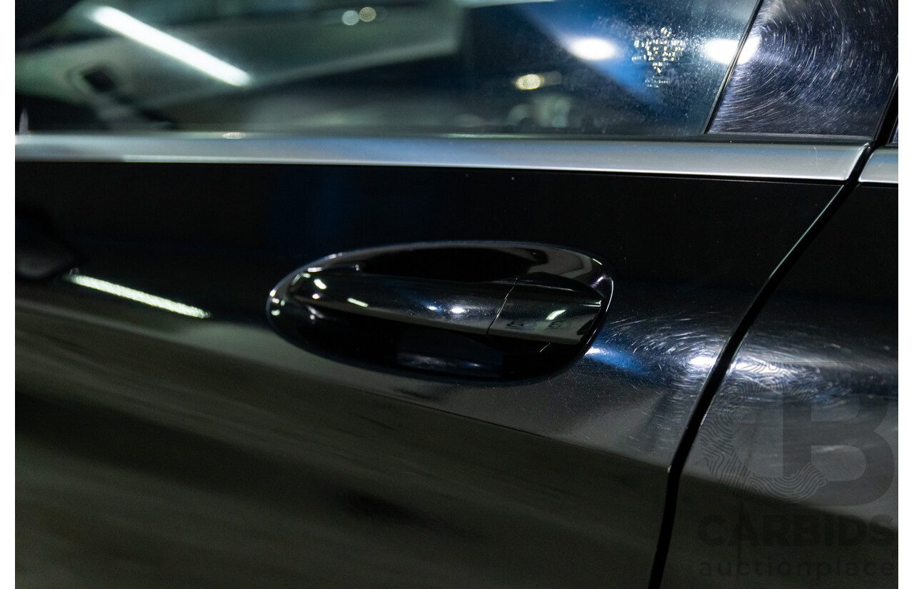 11/2014 Mercedes-Benz GLA200 CDI (FWD) X156 4d Wagon Cosmos Black Metallic Turbo 2.1L