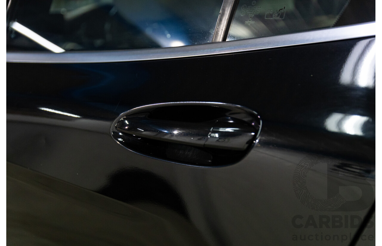 11/2014 Mercedes-Benz GLA200 CDI (FWD) X156 4d Wagon Cosmos Black Metallic Turbo 2.1L