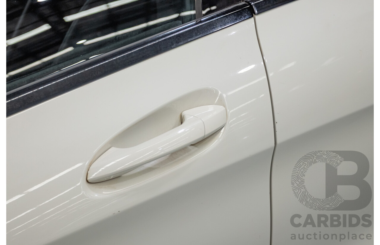 10/2014 Mercedes-Benz CLA200 117 4D Coupe Calcite White Turbo 1.6L