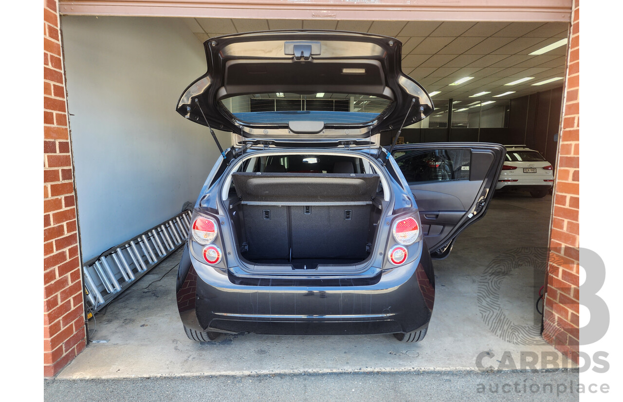 6/2013 Holden Barina CD TM MY13 5d Hatchback Black 1.6L