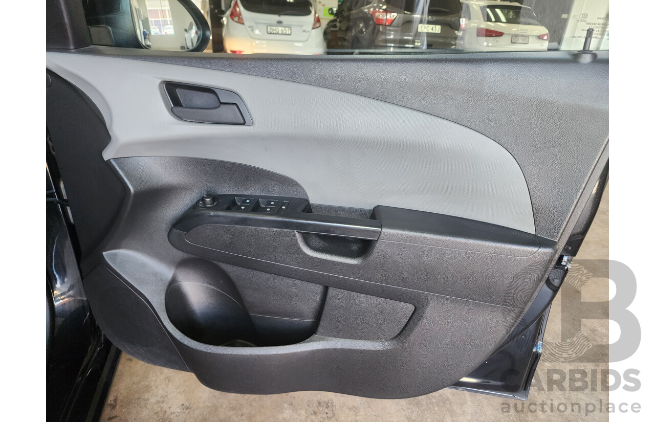 6/2013 Holden Barina CD TM MY13 5d Hatchback Black 1.6L