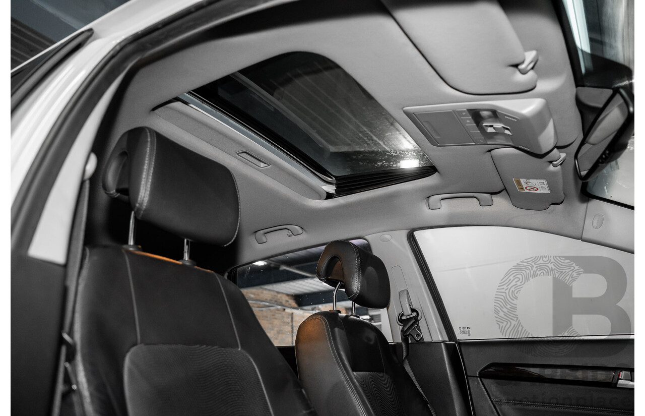 3/2014 Holden Captiva 7 LTZ (AWD) CG MY15 4d Wagon Summit White V6 3.0L - 7 Seater