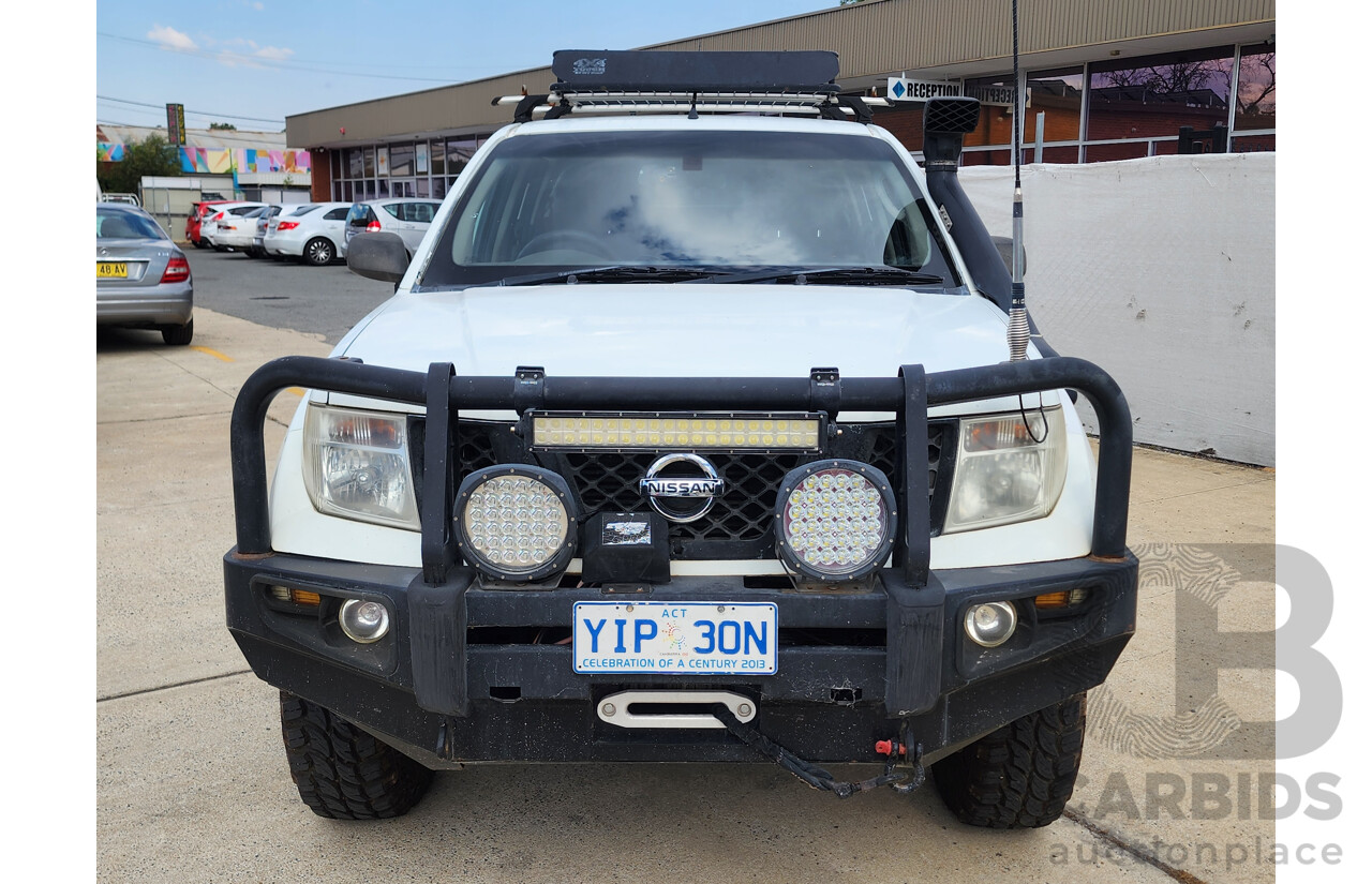 2/2009 Nissan Navara RX (4x4) D40 Dual Cab P/Up White 2.5L