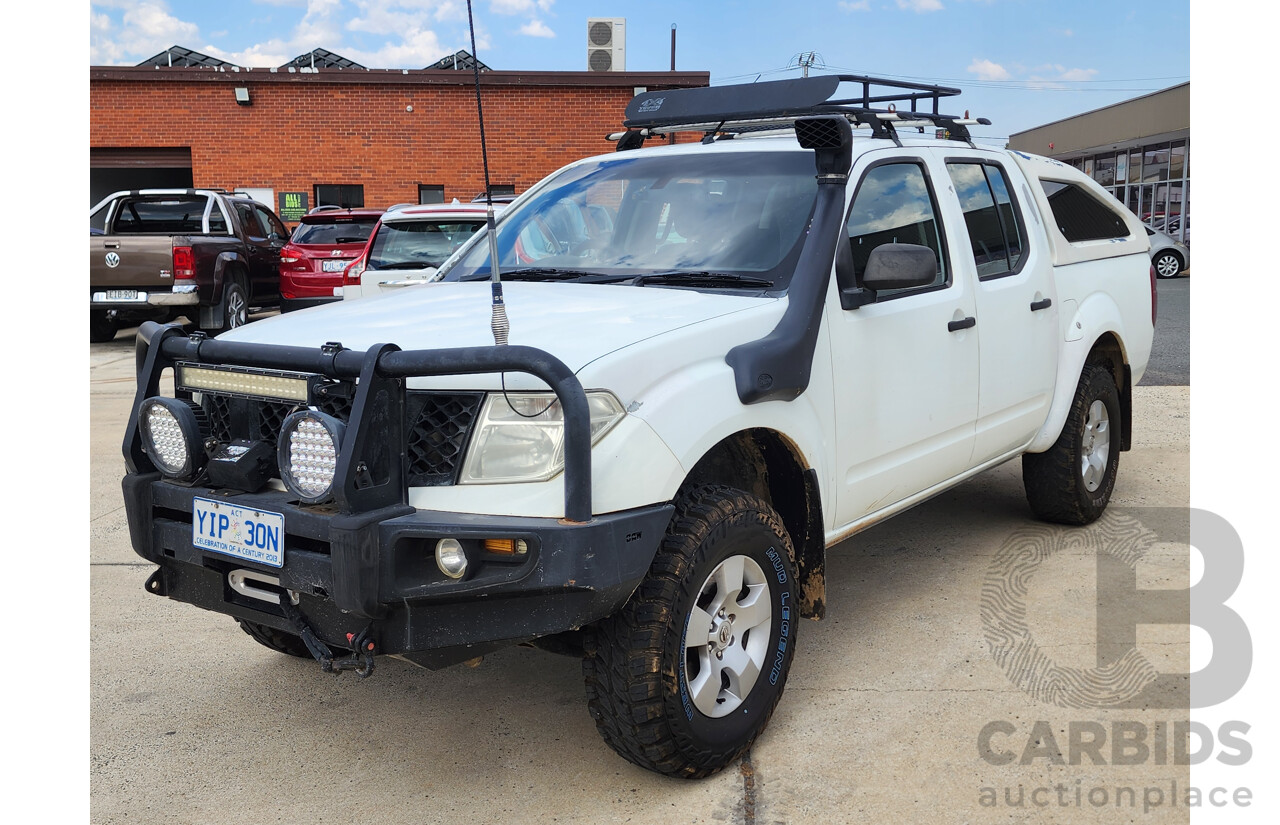 2/2009 Nissan Navara RX (4x4) D40 Dual Cab P/Up White 2.5L