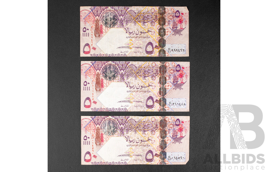 Three Qatar Fifty Riyals Notes
