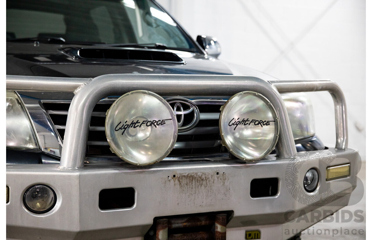 2/2012 Toyota Hilux SR5 (4x4) KUN26R MY12 Dual Cab P/Up Black Mica Turbo Diesel 3.0L