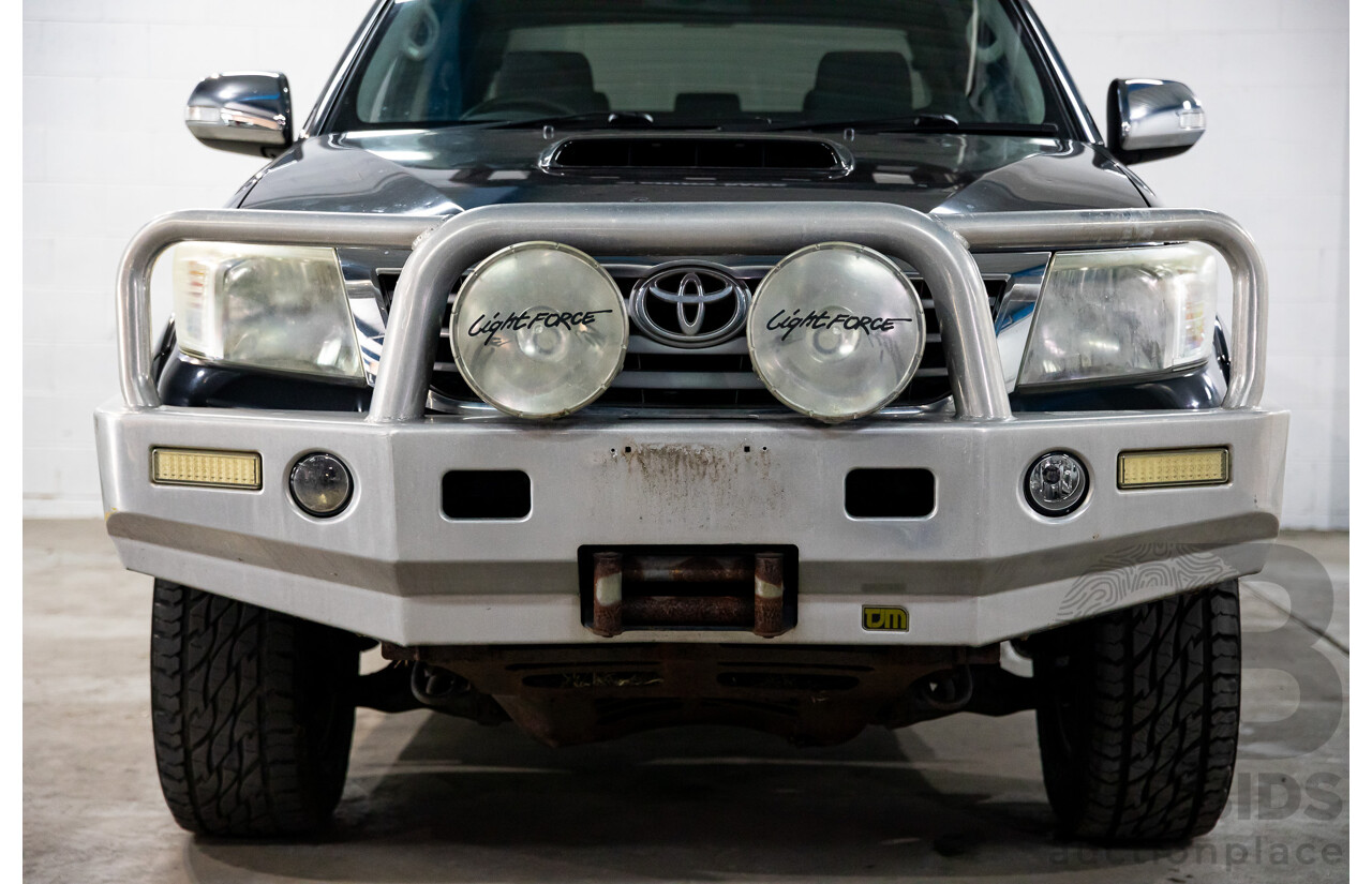 2/2012 Toyota Hilux SR5 (4x4) KUN26R MY12 Dual Cab P/Up Black Mica Turbo Diesel 3.0L