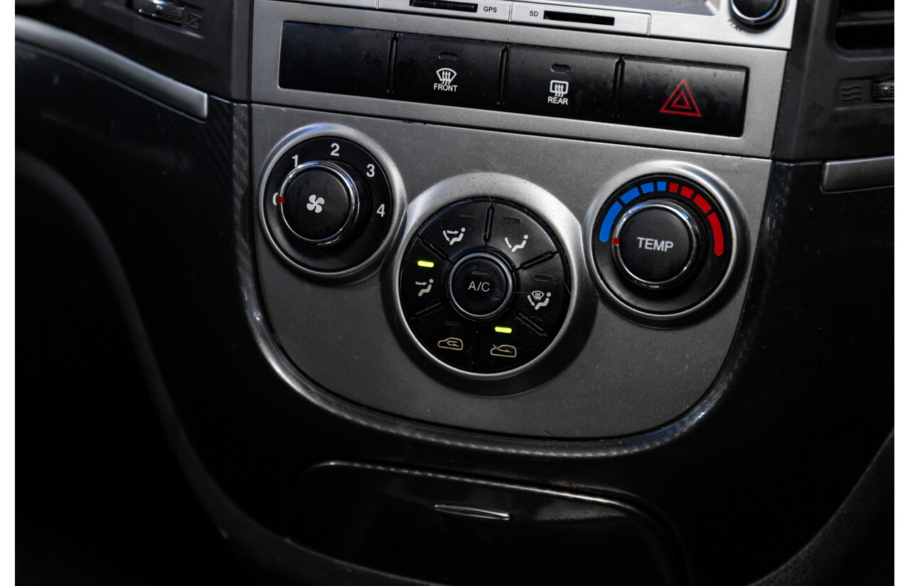 3/2010 Hyundai Santa Fe Elite CRDi (4x4) CM MY10 4d Wagon Vanilla White Turbo Diesel 2.2L - 7 Seater