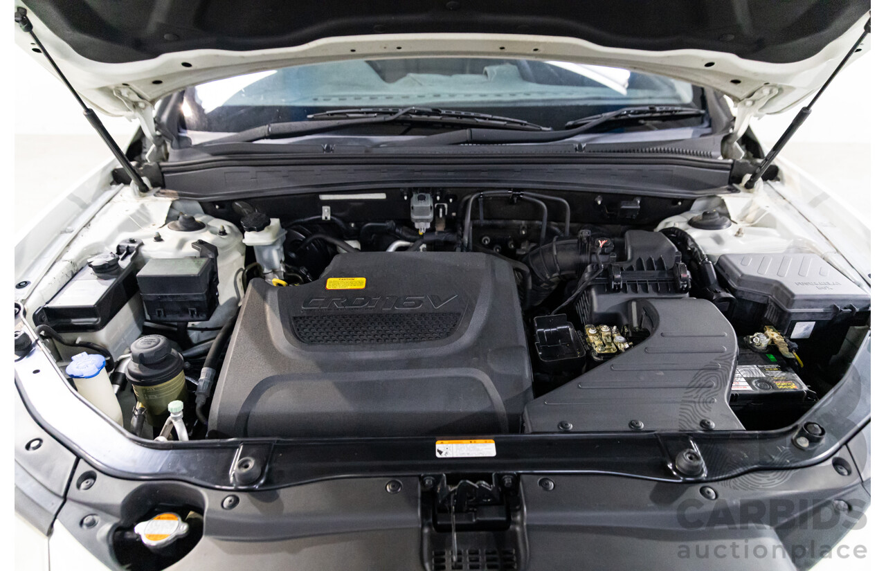 3/2010 Hyundai Santa Fe Elite CRDi (4x4) CM MY10 4d Wagon Vanilla White Turbo Diesel 2.2L - 7 Seater