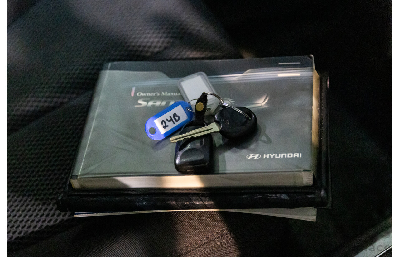 3/2010 Hyundai Santa Fe Elite CRDi (4x4) CM MY10 4d Wagon Vanilla White Turbo Diesel 2.2L - 7 Seater