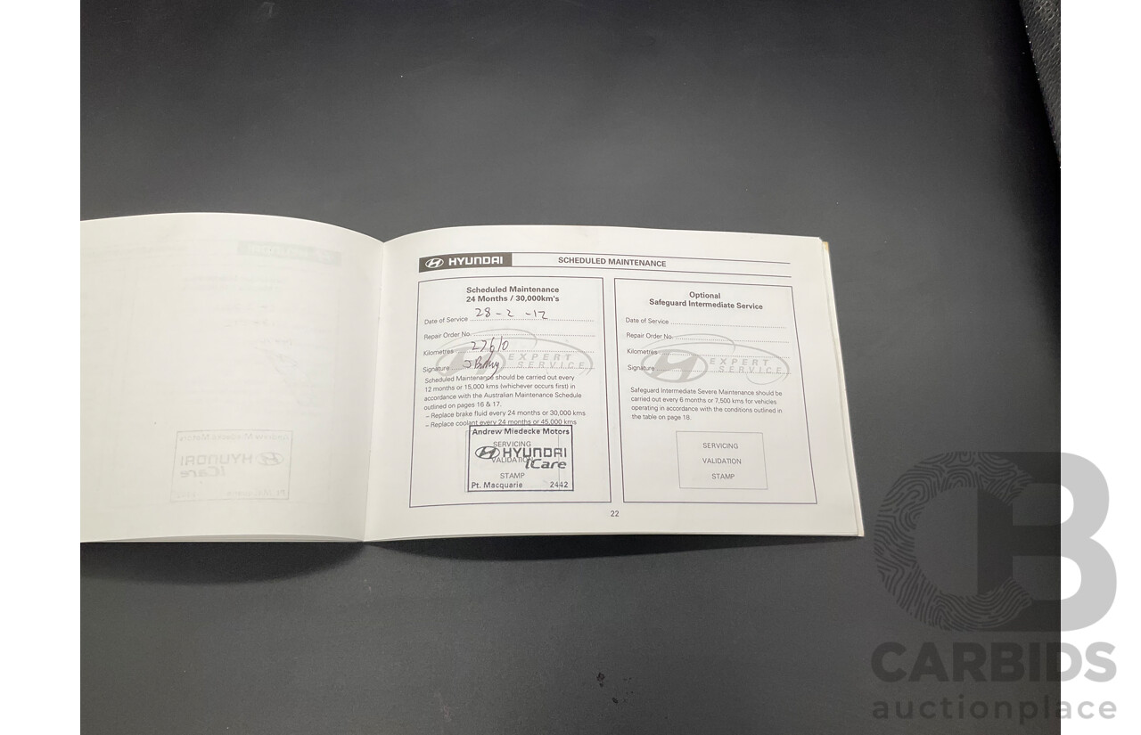 3/2010 Hyundai Santa Fe Elite CRDi (4x4) CM MY10 4d Wagon Vanilla White Turbo Diesel 2.2L - 7 Seater