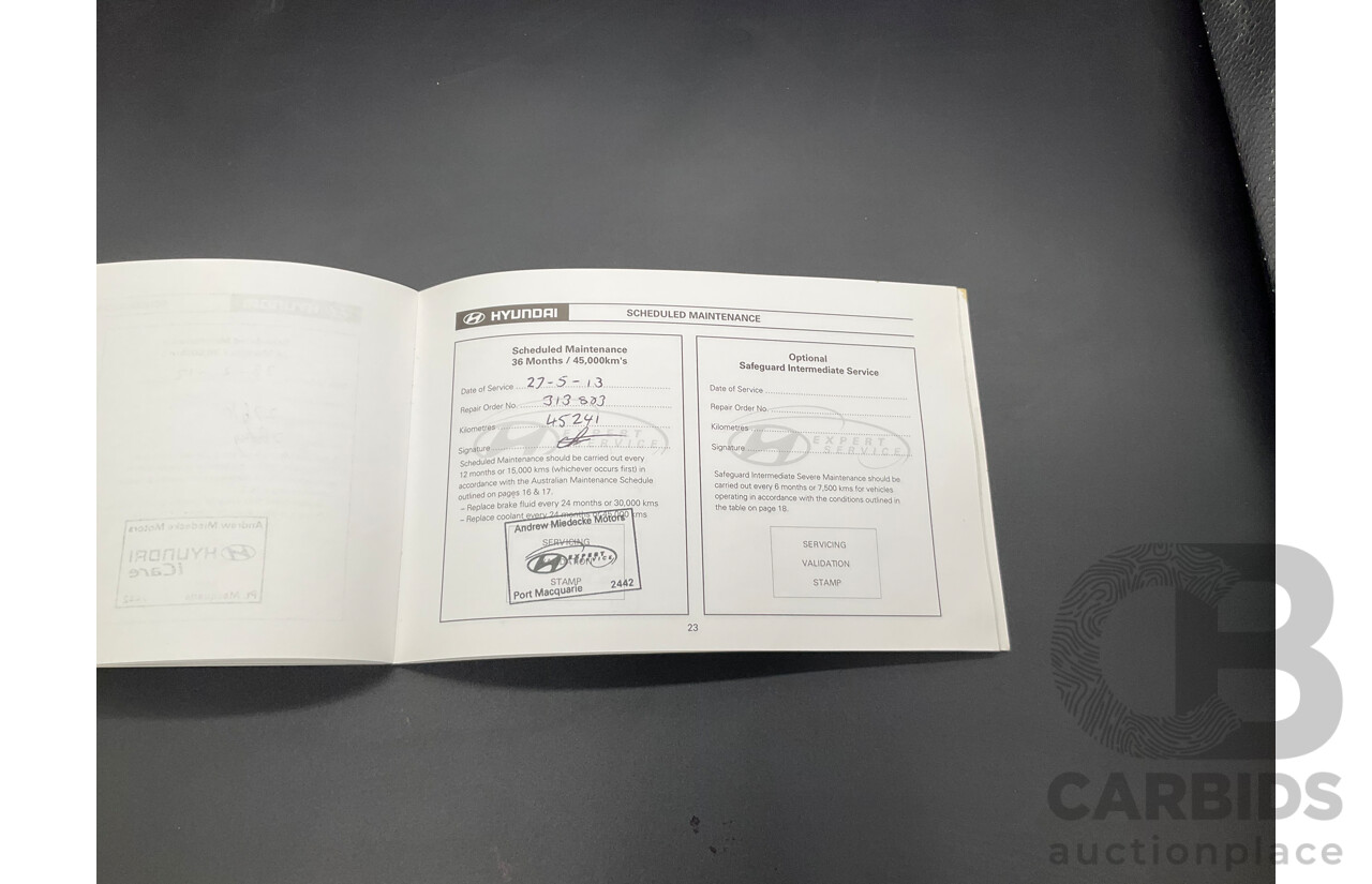 3/2010 Hyundai Santa Fe Elite CRDi (4x4) CM MY10 4d Wagon Vanilla White Turbo Diesel 2.2L - 7 Seater