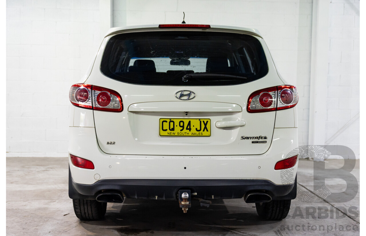 3/2010 Hyundai Santa Fe Elite CRDi (4x4) CM MY10 4d Wagon Vanilla White Turbo Diesel 2.2L - 7 Seater