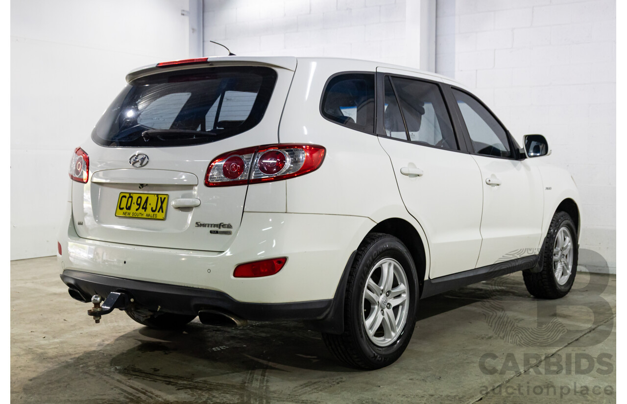 3/2010 Hyundai Santa Fe Elite CRDi (4x4) CM MY10 4d Wagon Vanilla White Turbo Diesel 2.2L - 7 Seater